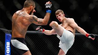 LONDON, ENGLAND - FEBRUARY 27: Arnold Allen of England (R) in action against Yaotzin Meza of USA during the Featherweight Bout of the UFC Fight Night at The O2 Arena on February 27, 2016 in London, England. (Photo by Christopher Lee/Getty Images)