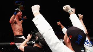 LONDON, ENGLAND - FEBRUARY 27: Michael 'The Count' Bisping of England celebrates after his victory over Anderson 'The Spider' Silva of Brazil in their Middleweight bout during the UFC Fight Night held at at Indigo at The O2 Arena on February 27, 2016 in