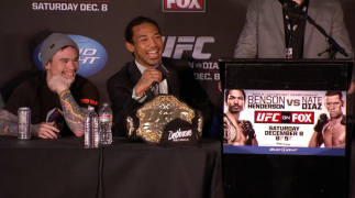 Benson Henderson and Scott Jorgensen are all smiles on the dais after their wins at UFC on FOX 5 in Seattle