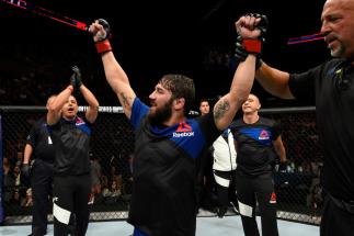 UNIONDALE, NY - JULY 22:  Jimmie Rivera celebrates after defeating Thomas Almeida of Brazil in their bantamweight bout during the UFC Fight Night event inside the Nassau Veterans Memorial Coliseum on July 22, 2017 in Uniondale, New York. (Photo by Josh He