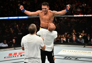 EDMONTON, AB - SEPTEMBER 09: Rafael Dos Anjos of Brazil celebrates his submission victory over Neil Magny in their welterweight bout during the UFC 215 event inside the Rogers Place on September 9, 2017 in Edmonton, Alberta, Canada. (Photo by Jeff Bottar