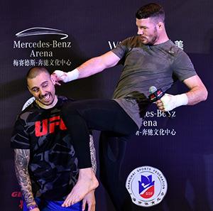 SHANGHAI, CHINA - NOVEMBER 23: (L-R) Dan Hardy speaks with Michael Bisping of England after his open workout session for the media inside the Kerry Hotel Pudong on November 23, 2017 in Shanghai, China. (Photo by Brandon Magnus/Zuffa LLC)