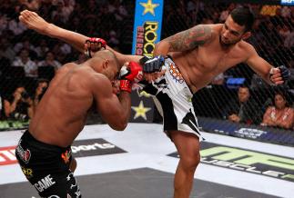 DALLAS, TX - JUNE 18: (R-L) Fabricio Werdum kicks Alistair Overeem during a Heavyweight bout at the Strikeforce event at American Airlines Center on June 18, 2011 in Dallas, Texas. (Photo by Esther Lin/Forza LLC/Forza LLC via Getty Images)