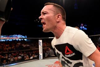SINGAPORE - JUNE 17: Colby Covington celebrates after his unanimous-decision victory over Dong Hyun Kim of South Korea in their welterweight bout during the UFC Fight Night event at the Singapore Indoor Stadium on June 17, 2017 in Singapore. (Photo by B