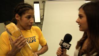 Julianna Pena Holds Her Trophy after Winning TUF 18