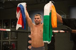 LAS VEGAS, NV - AUGUST 10: (L-R) Artem Lobov celebrates his victory over James Jenkins during the filming of The Ultimate Fighter: Team McGregor vs Team Faber at the UFC TUF Gym on August 10, 2015 in Las Vegas, Nevada. (Photo by Brandon Magnus/Zuffa LLC/