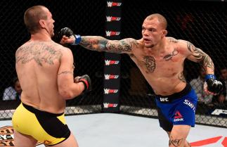 Anthony Smith punches Elvis Mutapcic of Bosnia in their middleweight bout during The Ultimate Fighter Finale event inside the Pearl concert theater at the Palms Resort & Casino on December 3, 2016 in Las Vegas, Nevada. (Photo by Jeff Bottari/Zuffa LLC/Zuf