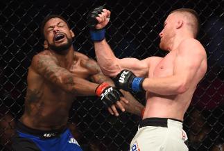 LAS VEGAS, NV - JULY 07: (R-L) Justin Gaethje punches Michael Johnson in their lightweight bout during The Ultimate Fighter Finale at T-Mobile Arena on July 7, 2017 in Las Vegas, Nevada. (Photo by Brandon Magnus/Zuffa LLC/Zuffa LLC via Getty Images)