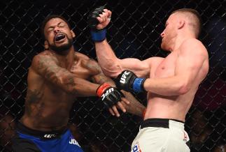 LAS VEGAS, NV - JULY 07:  (R-L) Justin Gaethje punches Michael Johnson in their lightweight bout during The Ultimate Fighter Finale at T-Mobile Arena on July 7, 2017 in Las Vegas, Nevada.  (Photo by Brandon Magnus/Zuffa LLC/Zuffa LLC via Getty Images)