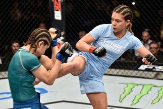 LAS VEGAS, NV - DECEMBER 01:  (R-L) Nicco Montano kicks Roxanne Modafferi in their women's flyweight championship bout during the TUF Finale event inside Park Theater on December 01, 2017 in Las Vegas, Nevada. (Photo by Jeff Bottari/Zuffa LLC/Zuffa LLC vi