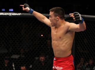 Jake Ellenberger celebrates his win.