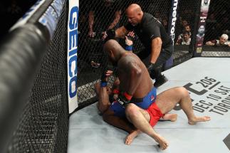 ALBANY, NY - DECEMBER 09: (R-L) Derrick Lewis punches Shamil Abdurakhimov of Russia in their heavyweight bout during the UFC Fight Night event at the Times Union Center on December 9, 2016 in Albany, New York. (Photo by Patrick Smith/Zuffa LLC/Zuffa LLC