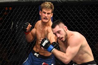 AUSTIN, TX - FEBRUARY 18: Sage Northcutt (L) punches Thibault Gouti of France in their lightweight bout during the UFC Fight Night event at Frank Erwin Center on February 18, 2018 in Austin, Texas. (Photo by Josh Hedges/Zuffa LLC/Zuffa LLC via Getty Ima