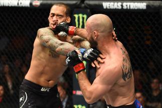 AUSTIN, TX - FEBRUARY 18: Donald Cerrone (R) punches Yancy Medeiros in their welterweight bout during the UFC Fight Night event at Frank Erwin Center on February 18, 2018 in Austin, Texas. (Photo by Josh Hedges/Zuffa LLC/Zuffa LLC via Getty Images)