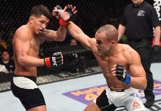 BOSTON, MA - JANUARY 17: (R-L) Eddie Alvarez punches Anthony Pettis in their lightweight bout during the UFC Fight Night event inside TD Garden on January 17, 2016 in Boston, Massachusetts. (Photo by Jeff Bottari/Zuffa LLC/Zuffa LLC via Getty Images)