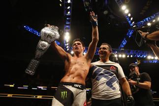 BOSTON, MA - JANUARY 17: Dominick Cruz celebrates defeating T.J. Dillashaw (not pictured) to win the World Bantamweight Championship during UFC Fight Night 81 at TD Banknorth Garden on January 17, 2016 in Boston, Massachusetts. (Photo by Maddie Meyer/Ge