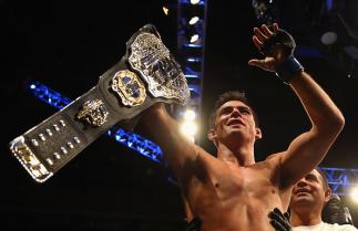 BOSTON, MA - JANUARY 17: Dominick Cruz celebrates defeating T.J. Dillashaw (not pictured) to win the World Bantamweight Championship during UFC Fight Night 81 at TD Banknorth Garden on January 17, 2016 in Boston, Massachusetts. (Photo by Maddie Meyer/Ge