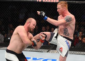 BOSTON, MA - JANUARY 17: (R-L) Ed Herman kicks Tim Boetsch in their light heavyweight bout during the UFC Fight Night event inside TD Garden on January 17, 2016 in Boston, Massachusetts. (Photo by Jeff Bottari/Zuffa LLC/Zuffa LLC via Getty Images)