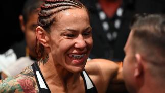 CURITIBA, BRAZIL - MAY 14: Cristiane 'Cyborg' Justino of Brazil prepares to enter the Octagon before facing Leslie Smith in their women's catchweight bout during the UFC 198 event at Arena da Baixada stadium on May 14, 2016 in Curitiba, Parana, Brazil.