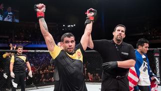 BRASILIA, BRAZIL - SEPTEMBER 24: Renan Barao of Brazil celebrates victory over Phillipe Nover of the United States in their flyyweight UFC bout during the UFC Fight Night event at Nilson Nelson gymnasium on September 24, 2016 in Brasilia, Brazil. (Photo b