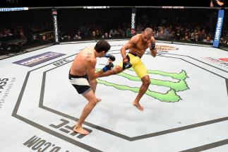 CHICAGO, IL - JULY 23: (R-L) Edson Barboza of Brazil kicks the leg of Gilbert Melendez in their lightweight bout during the UFC Fight Night event at the United Center on July 23, 2016 in Chicago, Illinois. (Photo by Josh Hedges/Zuffa LLC/Zuffa LLC via Ge