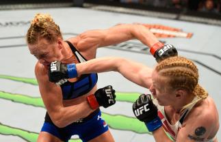 CHICAGO, IL - JULY 23: (R-L) Valentina Shevchenko of Kyrgyzstan punches Holly Holm in their women's bantamweight bout during the UFC Fight Night event at the United Center on July 23, 2016 in Chicago, Illinois. (Photo by Josh Hedges/Zuffa LLC/Zuffa LLC v