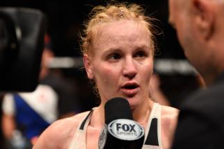 CHICAGO, IL - JULY 23: Valentina Shevchenko of Kyrgyzstan speaks with Joe Rogan after defeating Holly Holm in their women's bantamweight bout during the UFC Fight Night event at the United Center on July 23, 2016 in Chicago, Illinois. (Photo by Josh Hedg