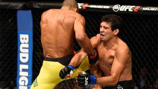 CHICAGO, IL - JULY 23: (L-R) Edson Barboza of Brazil lands a flying knee to the body of Gilbert Melendez in their lightweight bout during the UFC Fight Night event at the United Center on July 23, 2016 in Chicago, Illinois. (Photo by Josh Hedges/Zuffa LLC