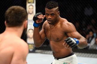 DENVER, CO - JANUARY 28:  (R-L) Francis Ngannou of Cameroon circles Andrei Arlovski of Belarus in their heavyweight bout during the UFC Fight Night event at the Pepsi Center on January 28, 2017 in Denver, Colorado. (Photo by Josh Hedges/Zuffa LLC/Zuffa LL