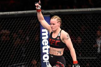 DENVER, CO - JANUARY 28: Valentina Shevchenko of Kyrgyzstan celebrates her submission victory over Julianna Pena in their women's bantamweight bout during the UFC Fight Night event at the Pepsi Center on January 28, 2017 in Denver, Colorado. (Photo by Jo