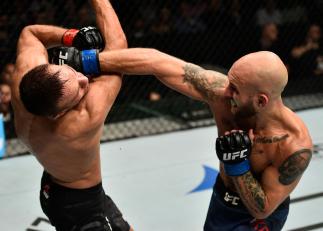 GDANSK, POLAND - OCTOBER 21: (R-L) Brian Kelleher punches Damian Stasiak of Poland in their bantamweight bout during the UFC Fight Night event inside Ergo Arena on October 21, 2017 in Gdansk, Poland. (Photo by Jeff Bottari/Zuffa LLC/Zuffa LLC via Getty I