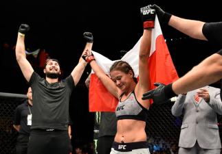GDANSK, POLAND - OCTOBER 21: Karolina Kowalkiewicz of Poland celebrates after her victory over Jodie Esquibel in their women's strawweight bout during the UFC Fight Night event inside Ergo Arena on October 21, 2017 in Gdansk, Poland. (Photo by Jeff Botta
