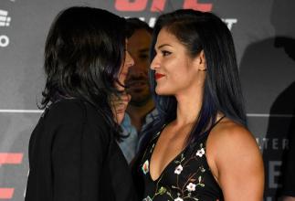 GLASGOW, SCOTLAND - JULY 13: (L-R) Opponents Joanne Calderwood of Scotland and Cynthia Calvillo face off during the UFC Ultimate Media Day at the Crowne Plaza Glasgow on July 13, 2017 in Glasgow, Scotland. (Photo by Josh Hedges/Zuffa LLC/Zuffa LLC via Ge