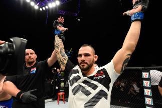 GLASGOW, SCOTLAND - JULY 16: Santiago Ponzinibbio of Argentina celebrates his victory over Gunnar Nelson of Iceland in their welterweight bout during the UFC Fight Night event at the SSE Hydro Arena Glasgow on July 16, 2017 in Glasgow, Scotland. (Photo b
