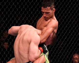 GOIANIA, BRAZIL - MAY 30: Charles Oliveira attempts to submit Nick Lentz of the United States in their featherweight UFC bout during the UFC Fight Night event at Arena Goiania on May 30, 2015 in Goiania, Brazil. (Photo by Buda Mendes/Zuffa LLC/Zuffa LLC v