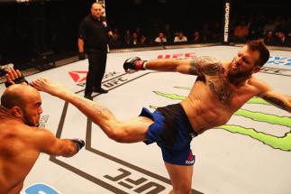 HAMBURG, GERMANY - SEPTEMBER 03: Ryan Bader (R) of the USA kicks facing Ilir Latifi (L) of Sweden compete in their Light Heavyweight Bout during the UFC Fight Night held at Barclaycard Arena on September 3, 2016 in Hamburg, Germany. (Photo by Dean Mouh