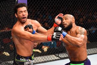 HOLLYWOOD, FL - JUNE 27: (R-L) Yoel Romero of Cuba punches Lyoto Machida of Brazil in their middleweight during the UFC Fight Night event at the Hard Rock Live on June 27, 2015 in Hollywood, Florida. (Photo by Josh Hedges/Zuffa LLC/Zuffa LLC via Getty Im
