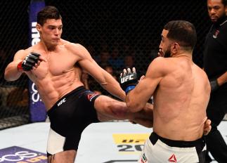 LAS VEGAS, NV - JULY 07: (L-R) Alan Jouban kicks Belal Muhammad in their welterweight bout during the UFC Fight Night event inside the MGM Grand Garden Arena on July 7, 2016 in Las Vegas, Nevada. (Photo by Jeff Bottari/Zuffa LLC/Zuffa LLC via Getty Imag