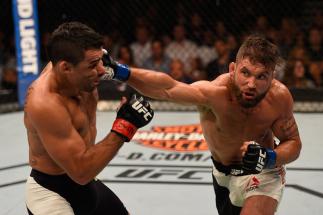 LAS VEGAS, NV - MAY 29: (R-L) Jeremy Stephens punches Renan Barao of Brazil in their featherweight bout during the UFC Fight Night event inside the Mandalay Bay Events Center on May 29, 2016 in Las Vegas, Nevada. (Photo by Josh Hedges/Zuffa LLC/Zuffa LLC