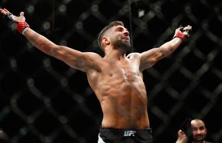 LONDON, ENGLAND - FEBRUARY 27: David Teymur of Sweden celebrates his victory over Martin Svensson of Sweden in the Lightweight Bout during the UFC Fight Night at The O2 Arena on February 27, 2016 in London, England. (Photo by Christopher Lee/Getty Imag