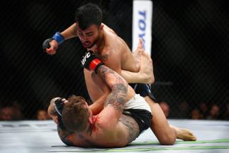 LONDON, ENGLAND - FEBRUARY 27: Makwan Amirkhani of Finland in action as he beats Mike Wilkinson of Great Britain during the Featherweight Bout of the UFC Fight Night at The O2 Arena on February 27, 2016 in London, England. (Photo by Christopher Lee/Get