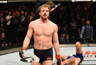LONDON, ENGLAND - MARCH 18: (L-R)Gunnar Nelson of Iceland celebrates his submission victory over Alan Jouban of the United States in their welterweight fight during the UFC Fight Night event at The O2 arena on March 18, 2017 in London, England. (Photo by
