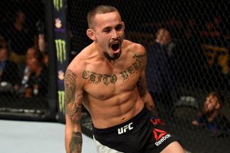 UNIONDALE, NY - JULY 22: Marlon Vera of Ecuador celebrates after submitting Brian Kelleher in their bantamweight bout during the UFC Fight Night event inside the Nassau Veterans Memorial Coliseum on July 22, 2017 in Uniondale, New York. (Photo by Josh He