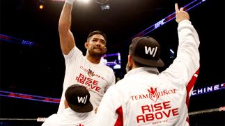 MANILA, PHILIPPINES - MAY 16: Mark Munoz of the United States celebrates his win over Luke Barnatt of England in their middleweight fight during the UFC Fight Night event at the Mall of Asia Arena on May 16, 2015 in Manila, Philippines. (Photo by Mitch V