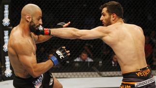 MANILA, PHILIPPINES - MAY 16: Gegard Mousasi of the Netherlands punches Costas Philippou of the United States in their middleweight fight during the UFC Fight Night event at the Mall of Asia Arena on May 16, 2015 in Manila, Philippines. (Photo by Mitch Vi