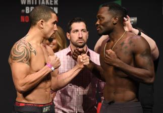 MELBOURNE, AUSTRALIA - NOVEMBER 26: (L-R) Opponents Robert Whittaker of New Zealand and Derek Brunson face off during the UFC weigh-in at Rod Laver Arena on November 26, 2016 in Melbourne, Australia. (Photo by Jeff Bottari/Zuffa LLC/Zuffa LLC via Getty