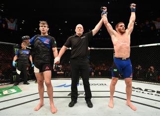 MELBOURNE, AUSTRALIA - NOVEMBER 27:   Andrew Holbrook celebrates his split-decision victory over Jake Matthews of Australia in their lightweight bout during the UFC Fight Night event at Rod Laver Arena on November 27, 2016 in Melbourne, Australia. (Photo 