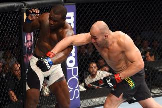 NASHVILLE, TN - AUGUST 08:  (R-L) Glover Teixeira of Brazil punches Ovince Saint Preux in their light heavyweight bout during the UFC Fight Night event at Bridgestone Arena on August 8, 2015 in Nashville, Tennessee.  (Photo by Josh Hedges/Zuffa LLC/Zuffa 