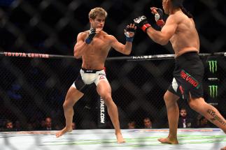 HOUSTON, TX - OCTOBER 03:  (L-R) Sage Northcutt faces Francisco Trevino in their lightweight bout during the UFC 192 event at the Toyota Center on October 3, 2015 in Houston, Texas. (Photo by Jeff Bottari/Zuffa LLC/Zuffa LLC via Getty Images)