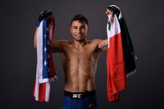 FRESNO, CA - DECEMBER 09: Alex Perez poses for a post fight portrait backstage during the UFC Fight Night event inside Save Mart Center on December 9, 2017 in Fresno, California. (Photo by Mike Roach/Zuffa LLC/Zuffa LLC via Getty Images)